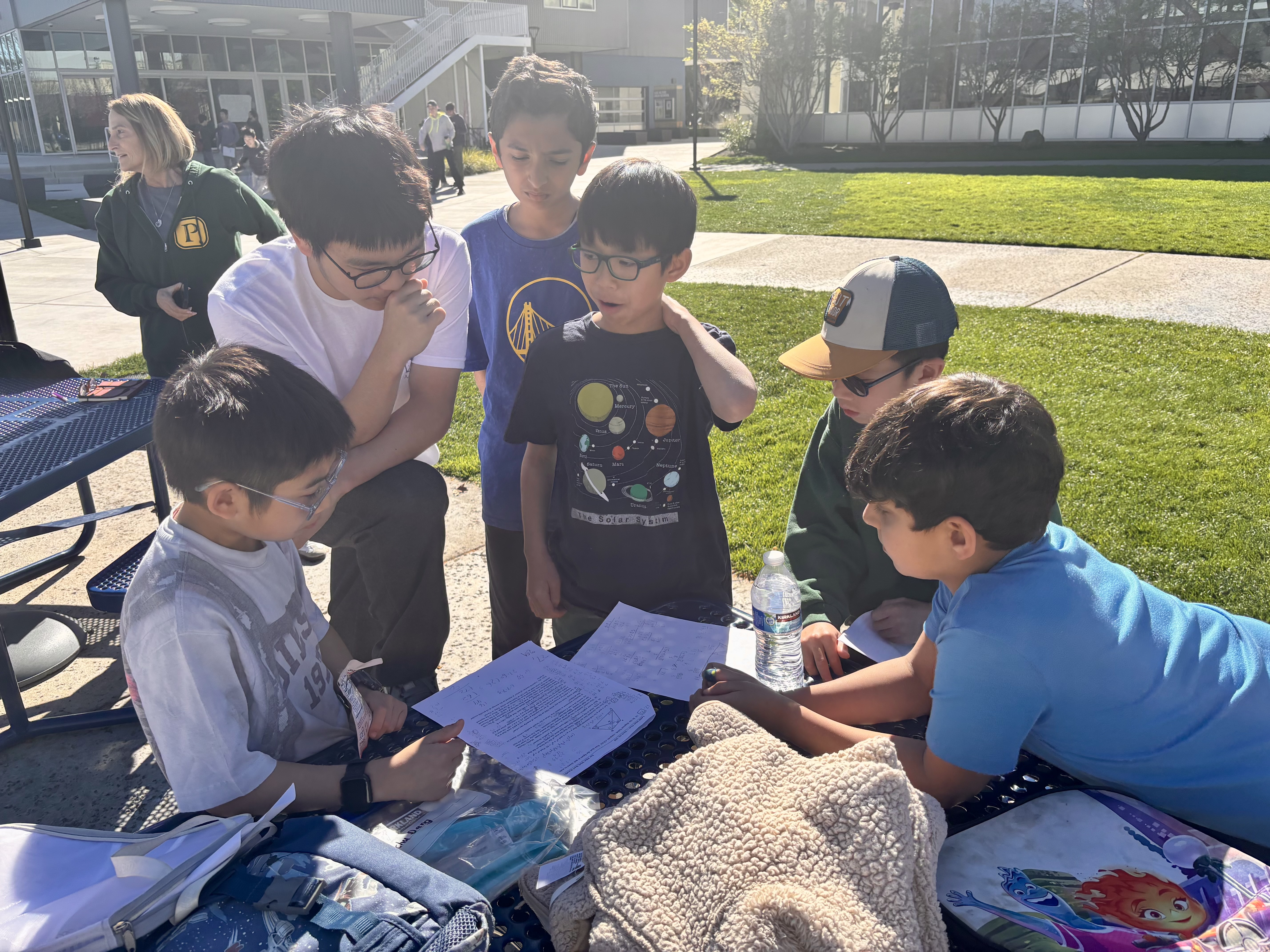 Joon explaining a problem after the individual round